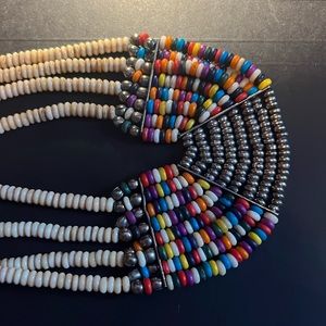 Handmade tribal influenced beaded necklace. metal